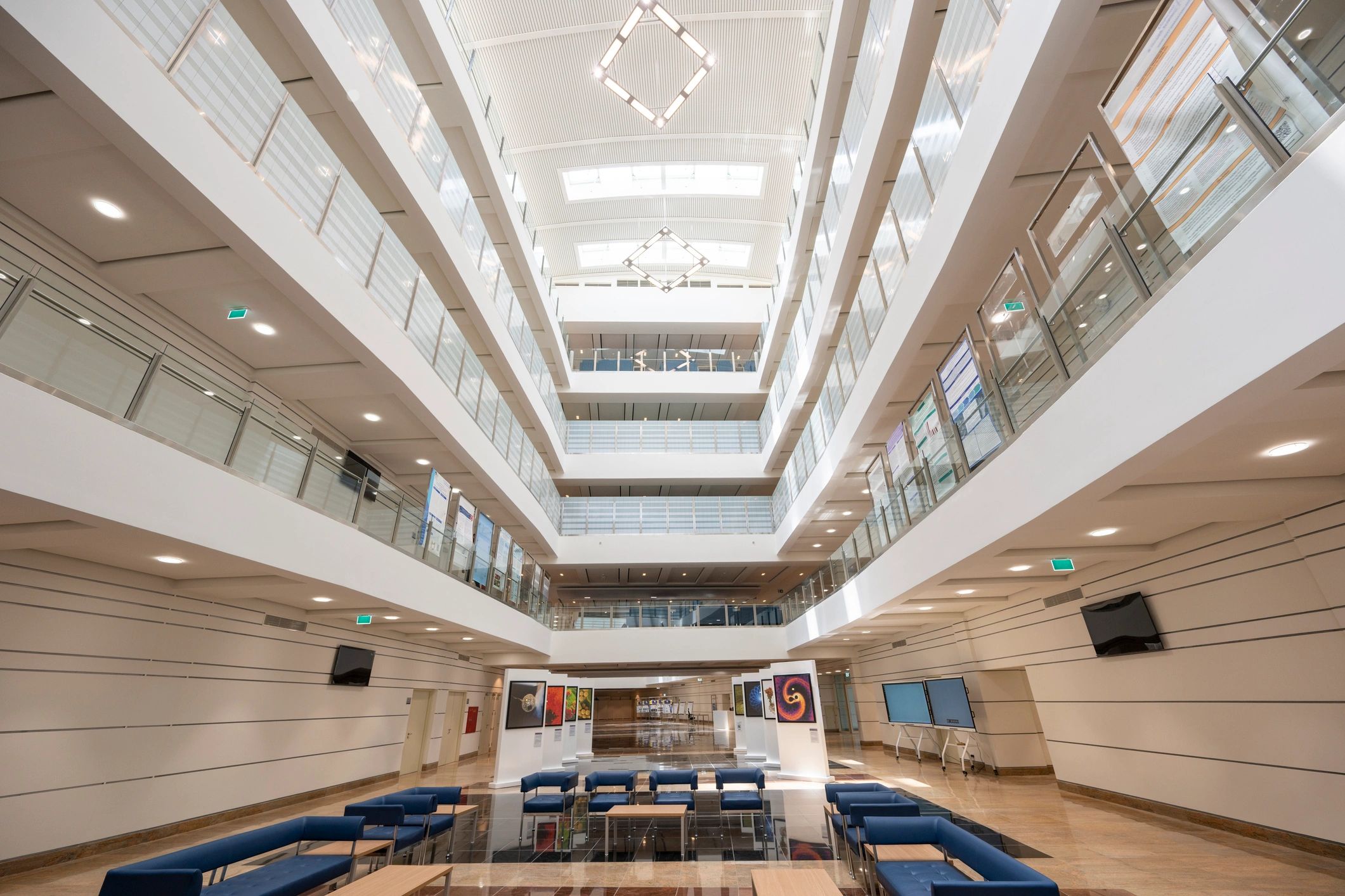 Bright interior atrium suggesting a bank lobby or civic interior